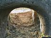 Borore: la Tomba di giganti Imbertighe: veduta dell’interno dal portello alla base della stele