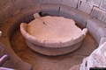 Oliena-Villaggio Sa Sedda e Sos Carros: bacile al centro della fonte sacra