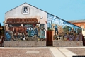 San Gavino Monreale-'Civiltà contadina', opera di Fernando Marrocu e Antonino Pilloni in via Amsicora 21 presso Casa Museo Dona Maxima
